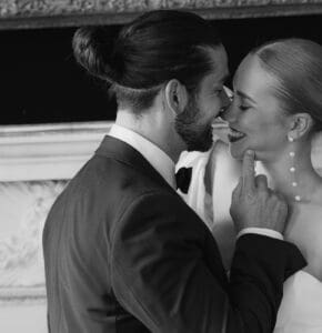 how to feel natural in wedding photos couple kissing naturally