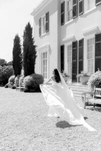  bride walking with her dress flowing naturally in the wind