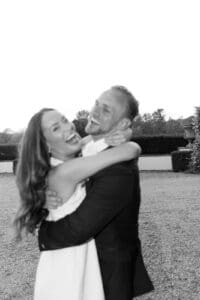 bride and groom laughing naturally during wedding day